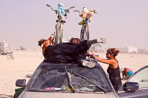 loading bicycles on roof rack, bicycles, car roof, jilian, packing, roof rack, sari, women