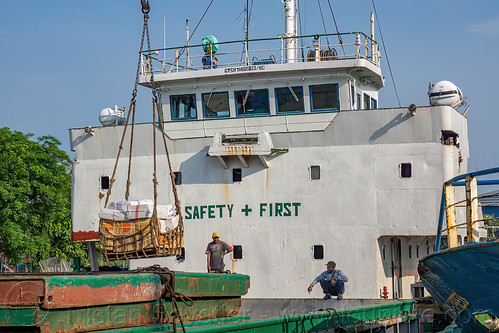 loading crate of cargo on ship, boat, cargo ship, dock, harbor, man, merchant ship, surabaya