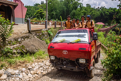 local school bus in toraja village, boys, dirt road, kids, school bus, tana toraja, truck