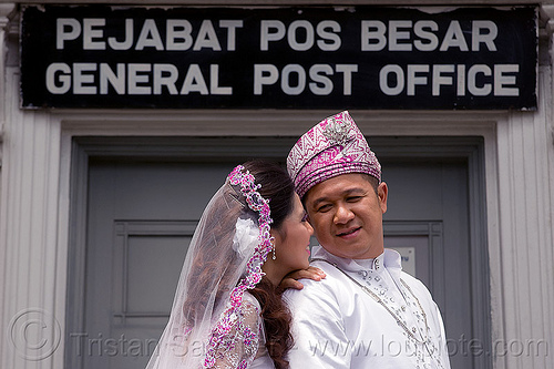 malay wedding - general post office (kuching), borneo, bouquet, bride, groom, kuching, malay wedding, malaysia, man, post office, sign, traditional wedding, wedding dress, woman