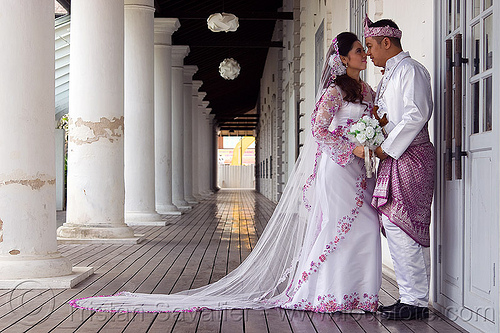 malay wedding - kuching (borneo), borneo, bridal bouquet, bride, columns, groom, kuching, malay wedding, malaysia, man, traditional wedding, wedding dress, white flowers, white roses, woman