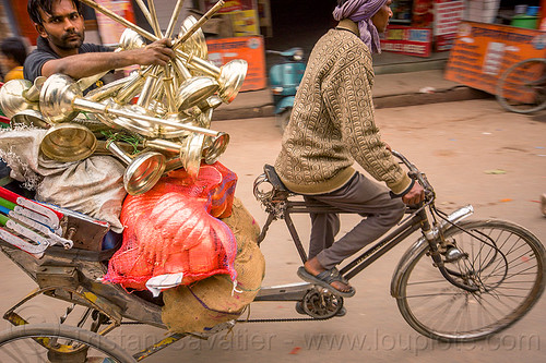 man carrying large objects on a cycle rickshaw, bags, cargo, carrying, cycle rickshaw, freight, men, moving, riding, sacks, varanasi