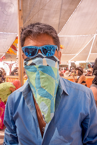 man in blue at center camp - burning man 2015, bandana, blue, burning man, face mask, mirror sunglasses