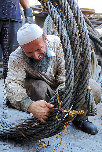 man rolling large steel cable (turkey country), beard, cables, istanbul, knot, man, muslim, roll, rope, steel cable, tie, tying, worker
