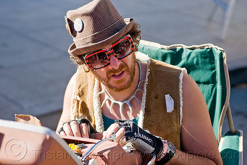 man typing with typewriter, hat, man, sunglasses, typewriter, typewriting