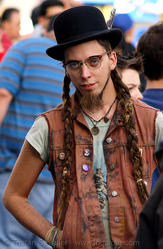 man with long braided dreadlocks hair, amish, beard, bowler hat, bracelets, braid, braided hair, deads, double dutch braids, dreadlocks, eyeglasses, eyewear, french, hippie, man, prescription glasses, spectacles, vest