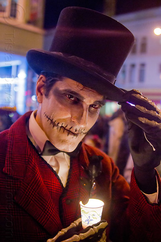 man with skull makeup and black hat - michael paim, candle, day of the dead, dia de los muertos, face painting, facepaint, halloween, hands, hat, man, michael paim, night, sugar skull makeup