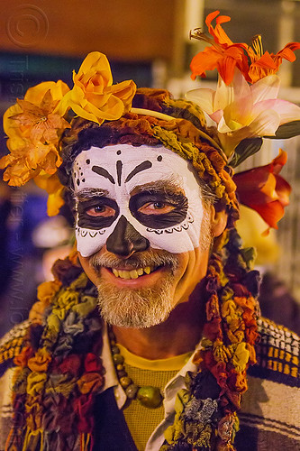 man with skull makeup and flower headdress, beard, day of the dead, dia de los muertos, face painting, facepaint, flower headdress, flowers, halloween, man, night, sugar skull makeup