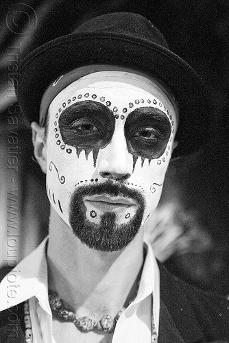 man with skull makeup - bindis - dia de los muertos - halloween (san francisco), beard, bindis, day of the dead, dia de los muertos, face painting, facepaint, goatee, halloween, hat, man, night, sugar skull makeup