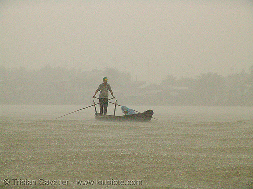 mekong river - monsoon rain - row boat - vietnam, heavy rain, mekong river, monsoon rain, pouring rain, river boat, rowing boat, small boat, standing rowing