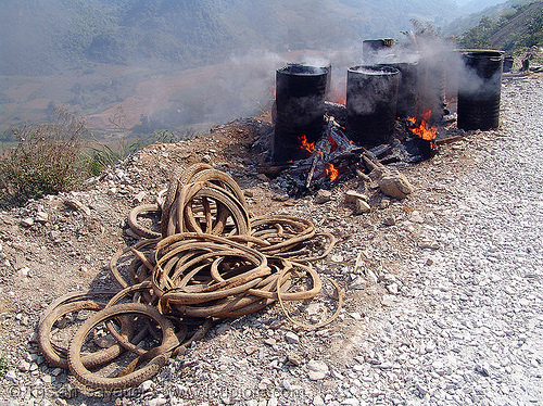 melting barrels of asphalt (bitumen) with fire - vietnam, barrels, burning, fire, groundwork, hot asphalt, hot bitumen, pavement, paving, road construction, roadworks, smoke, smoking