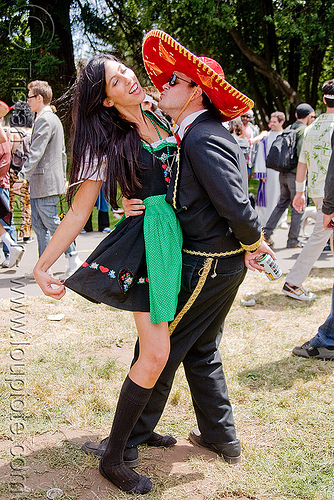 mexican couple dancing - red sombrero hat, bay to breakers, costume, footrace, hat, mexican, red sombrero, street party, woman