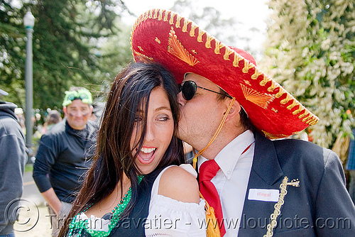 mexican couple with sombrero hat - bay to breaker footrace and street party (san francisco), bay to breakers, costume, footrace, hat, kissing, man, mexican, red sombrero, street party, woman