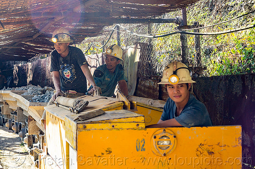 minecarts with ore load - balatoc mines (philippines), balatoc mines, gold mine, head light, mancart, men, mine railway, mine train, mine trolley, mine worker, miner, safety helmet, workers