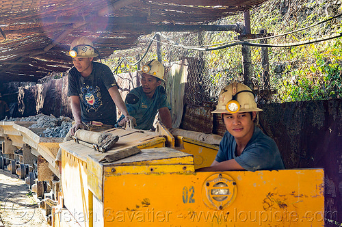 minecarts with ore load - balatoc mines (philippines), balatoc mines, gold mine, head light, mancart, men, mine railway, mine train, mine trolley, mine worker, miner, safety helmet, workers