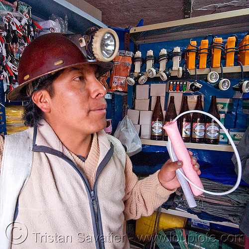 miner buying dynamite and ammonium nitrate (anfo) at the corner store - potosi (bolivia), ammonium nitrate, anfo, blasting caps, bolivia, cerro rico, dinabol, dynamite stick, fertilizer, flash lights, fuses, fuzes, man, mina candelaria, mine worker, miner, mining, potosí, safety helmet, sticks