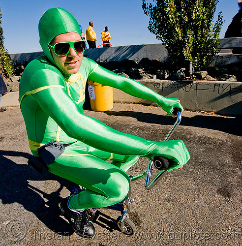 mini bike - green man - superhero street fair (san francisco), green costune, islais creek promenade, man, mini bike, sunglasses, superhero street fair