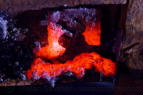 molten metal from iron rail cut with oxy-acetylene torch, demolition, light rail, molten metal, muni, night, ntk, railroad construction, railroad tracks, railway tracks, red hot, san francisco municipal railway, track maintenance, track work