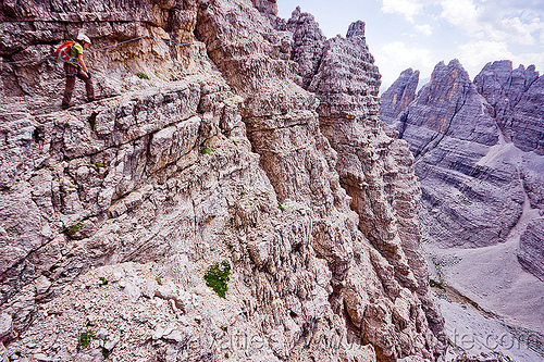 monte paterno via ferrata - dolomites, alps, cliff, climber, climbing harness, climbing helmet, dolomites, monte paterno, mountain climbing, mountaineer, mountaineering, mountains, parco naturale dolomiti di sesto, rock climbing, trail, vertical, via ferrata, woman