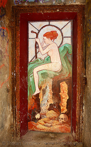 mucha-style graffiti painting on door, near the ffi shelter - catacombes de paris - catacombs of paris (off-limit area), abri ffi, art nouveau, cave, clandestines, denfert-rochereau, door, graffiti, illegal, jugendstil, marteau d'égoutier, mucha, painting, plaque soleil, skull, street art, tampon de regard, trespassing, underground quarry, woman