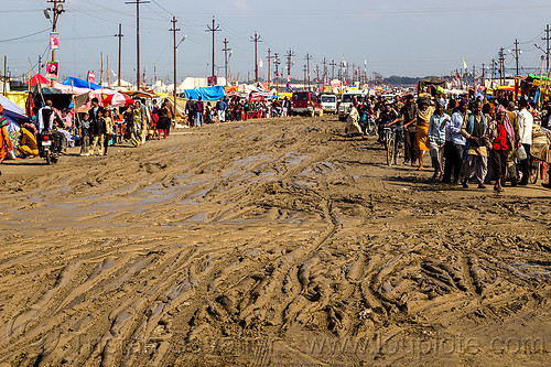 muddy road - kumbh mela 2013 (india), crowd, hindu pilgrimage, hinduism, india, maha kumbh mela, mud ruts, muddy road, muddy street, walking