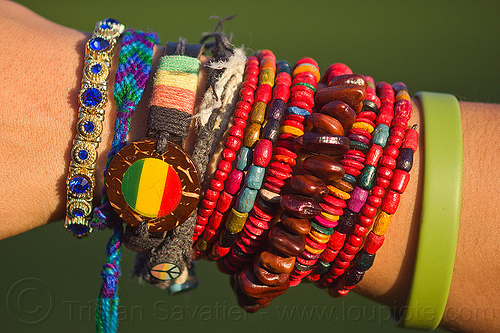 multicolor friendship bracelets on wrist, arm, closeup, colorful, fashion, friendship bands, friendship bracelets, hippie bracelets, jewelry, rubber band, rubber bracelet, seeds, woman, wooden beads, wrist
