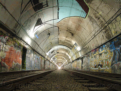 muni train tunnel with graffiti (san francisco), danger, dangerous, duboce tunnel, graffiti, light rail, metro, muni subway, no trespassing, rail tracks, railroad tracks, railway tracks, san francisco municipal railway, street art, sunset tunnel, train tracks, urbex, vanishing point