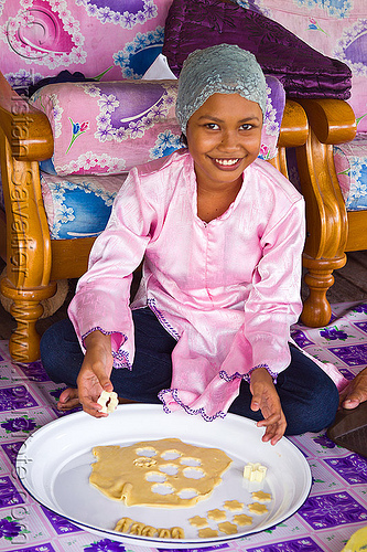 muslim girl making ramadan cookies - maizatul masleeza, borneo, cookie cutter, cookie dough, cooking, girl, maizatul masleeza, malaysia, muslim, pink, ramadan cookies, sitting, woman