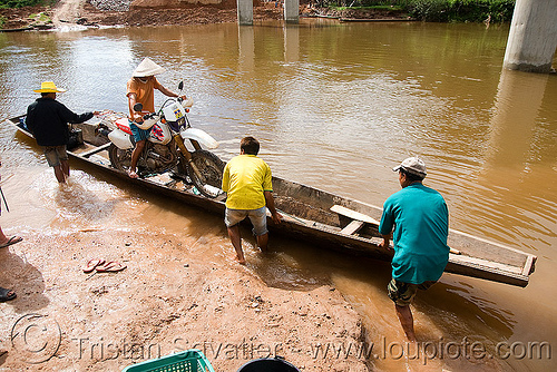 my motorcycle on a very small river-crossing boat (laos), 250cc, dual-sport, ferry boat, honda motorcycle, honda xr 250, kong lor, laos, motorcycle touring, river boats, river crossing, river ferry, road, rowing boat, small boat