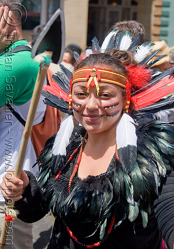 native american feather costume, american indian costume, bay to breakers, black feathers, face painting, facepaint, feather headdress, feather necklace, footrace, makeup, native american costume, spear, street party, warrior, woman