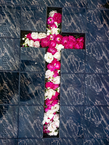 negative space cross filled with flowers on tomb - jogjakarta christian cemetery, christian cross, grave, graveyard, jogjakarta christian cemetery, negative form, negative space, tomb, tpu utaralaya