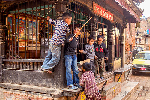 nepali boys playing around a pati (nepal), bhaktapur, boys, children, grid, kids, pati, playing