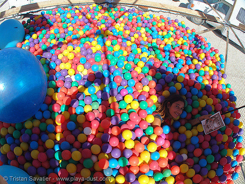 nicole in ball pit - burning man 2005, art installation, ball pit, colby boles, erin usher