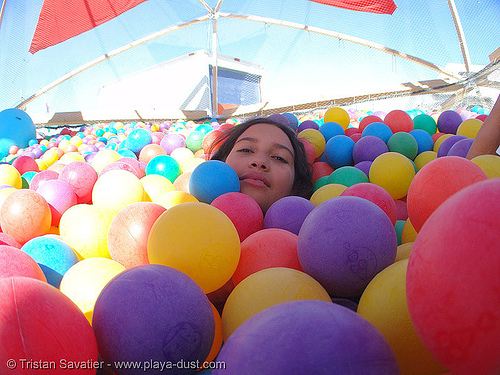 nicole in ball pit - burning man 2005, art installation, ball pit, colby boles, erin usher, nicole