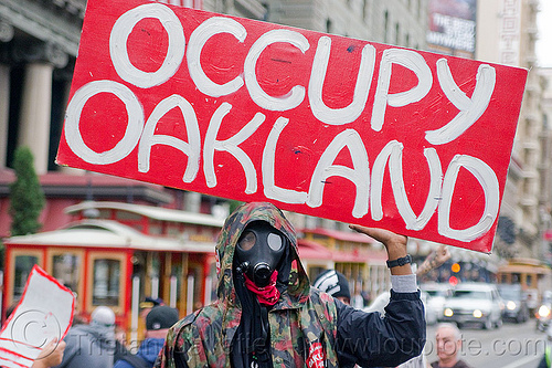 occupy oakland sign in protest, black friday, cablecar, demonstration, demonstrators, gas mask, occupy, ows, protest, protesters, sign, union square
