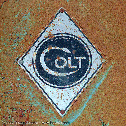 old colt logo in abandoned factory (san francisco), circle, colt defense, diamond, hunter's point, logo, lozenge, plate, rhombus, rusty