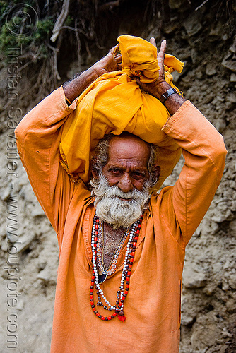 old hindu pilgrim carrying bag on head - amarnath yatra (pilgrimage) - kashmir, amarnath yatra, bhagwa, carrying on the head, hiking, hindu man, hindu pilgrimage, hinduism, kashmir, mountain trail, mountains, old man, pilgrim, saffron color, trekking, white beard