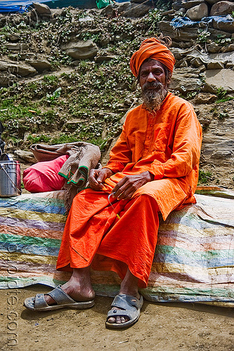old hindu pilgrim sitting, resting on trail - amarnath yatra (pilgrimage) - amarnath yatra (pilgrimage) - kashmir, amarnath yatra, beard, bhagwa, headwear, hindu man, hindu pilgrimage, hinduism, kashmir, mountain trail, mountains, old man, pilgrim, resting, saffron color