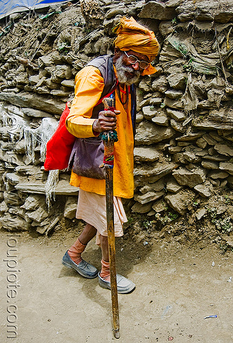 old hindu pilgrim with walking stick on trail - amarnath yatra (pilgrimage) - amarnath yatra (pilgrimage) - kashmir, amarnath yatra, bhagwa, hiking cane, hindu pilgrimage, hinduism, kashmir, man, mountain trail, mountains, pilgrim, saffron color, walking stick