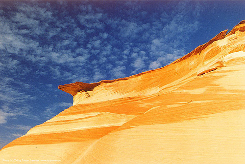 orange sandstone cliff - paria canyon, arizona