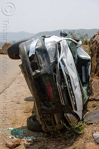 overturned car - tata indica, car accident, car crash, front, kashmir, overturned car, road, rollover, tata indica, tata motors, traffic accident, white, wreck