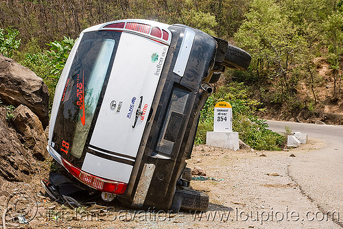 overturned car - tata indica, car accident, car crash, kashmir, overturned car, rear, road, rollover, tata indica, tata motors, traffic accident, white, wreck