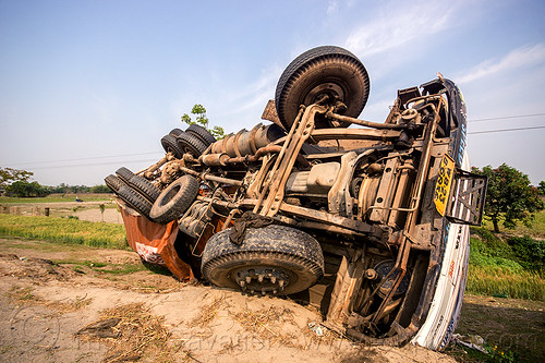 overturned truck in ditch (india), crash, ditch, india, lorry, overturned, road, rollover, tata motors, traffic accident, truck accident, twisted, underbelly, up-side-down, west bengal, wreck