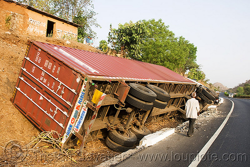 overturned truck (india), artic, articulated lorry, container, crash, ditch, india, man, overturned truck, road, rollover, semi truck, tata motors, traffic accident, truck accident, wreck
