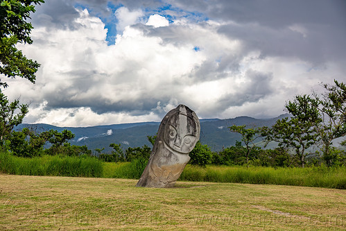 palindo megalith - bada valley, bada valley megalith, lore lindu megalith, palindo monolith, stone statue