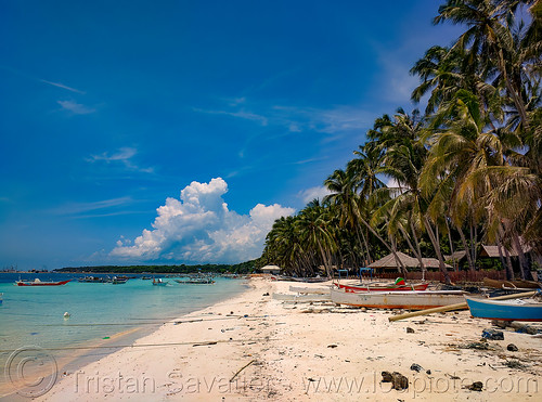 panrangluhu beach near bira, coconut trees, fishing boats, outrigger canoes, panrangluhu beach, pantai panrangluhu