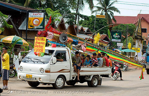 parading the giant bamboo fireworks rocket - vang vieng (laos), bamboo rocket, fireworks, parade, pyrotechnics, vang vieng