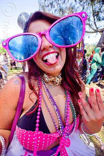 party girl with oversize party sunglasses, bay to breakers, beads, footrace, necklaces, novelty sunglasses, oversize sunglasses, panhandle, raver, sticking out tongue, sticking tongue out, street party, woman