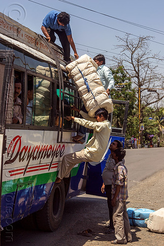 passenger loading luggage on indian bus - pushing large bundle over the head (india), bundle, bus, carrying on the head, freight, load, loading, luggage, men, passengers