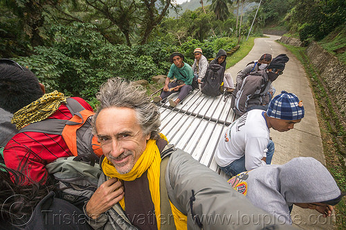 passengers riding on roof of jeepney (philippines), cordillera, jeepneys, man, passengers, road, roof, self portrait, selfie, sitting